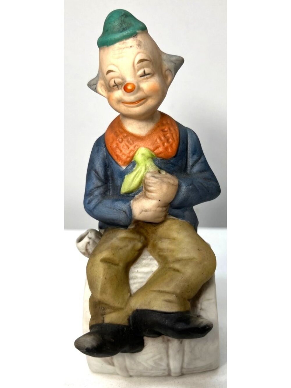 Vintage Porcelain Clown Figurine Holding Banana